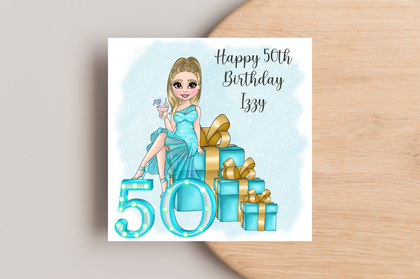 50th Birthday Card Personalised- Lady in Blue Dress Sitting on Glittering Presents