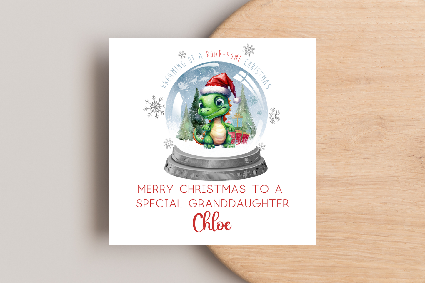 Personalised Dinosaur Snowglobe Christmas Card