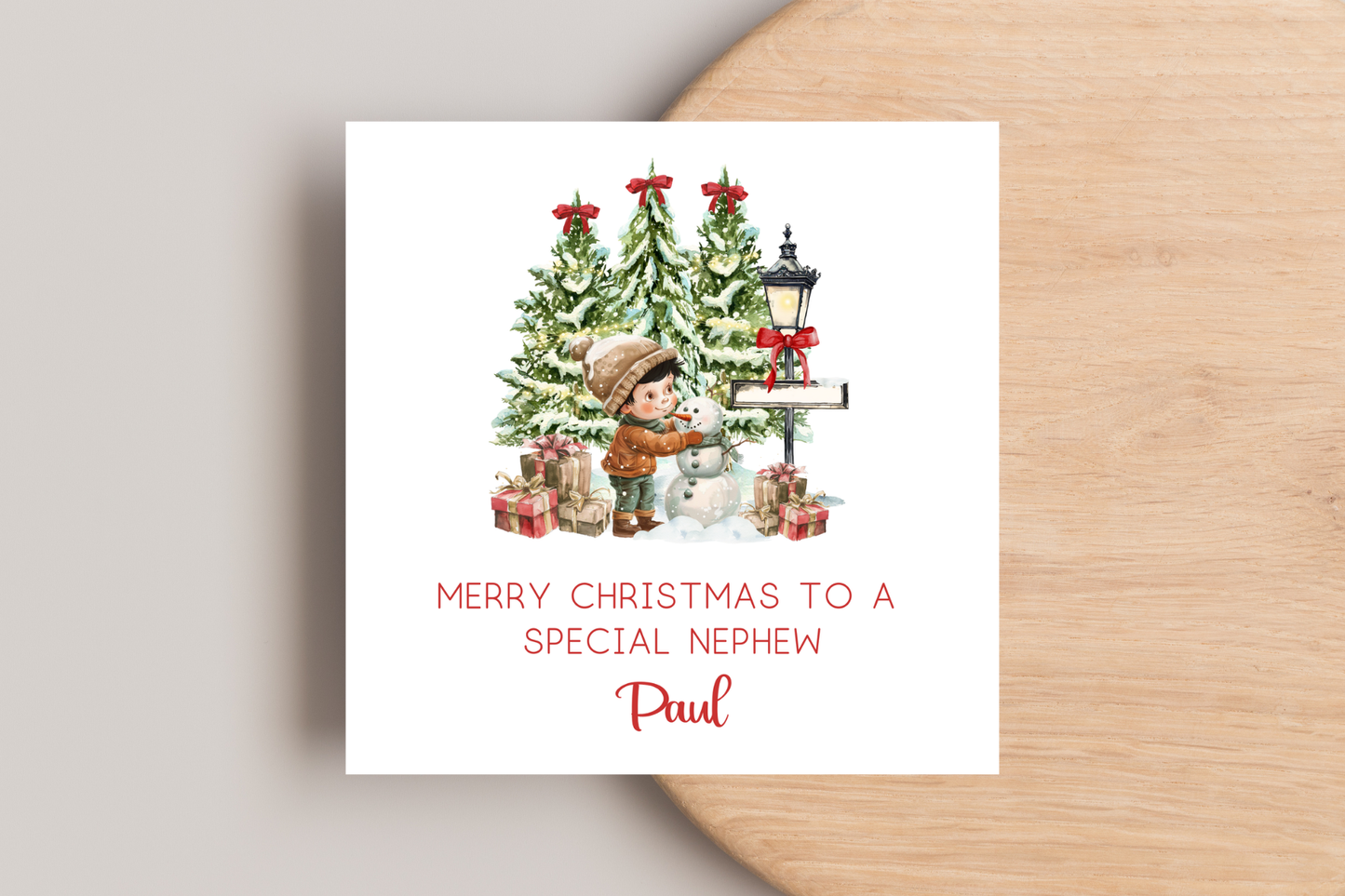 Personalised Snowman Building Little Boy Christmas Card