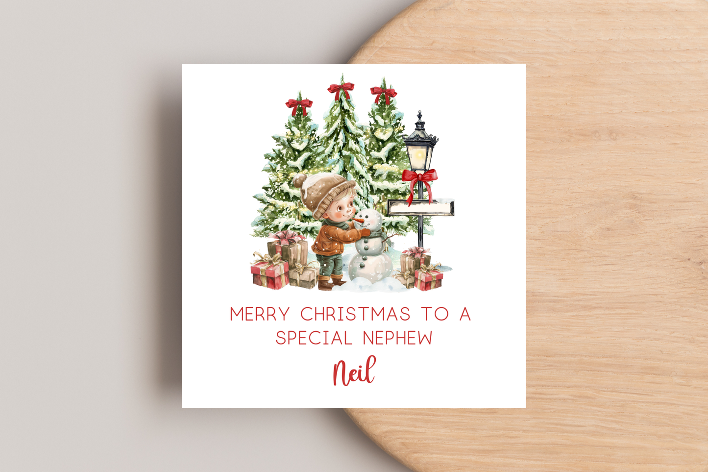 Personalised Snowman Building Little Boy Christmas Card