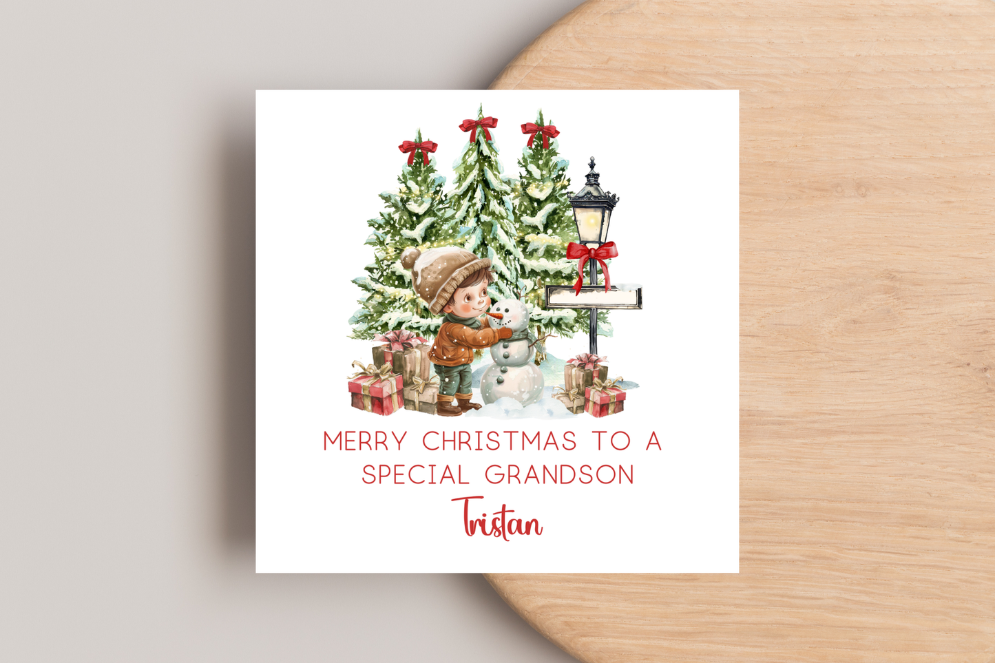 Personalised Snowman Building Little Boy Christmas Card