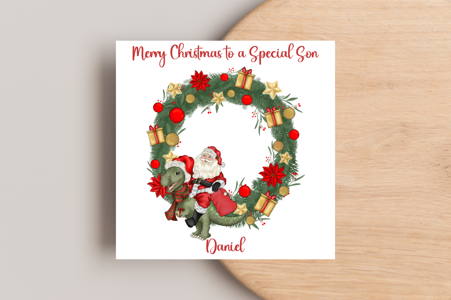 Santa riding a Dinosaur in a Wreath Christmas Card