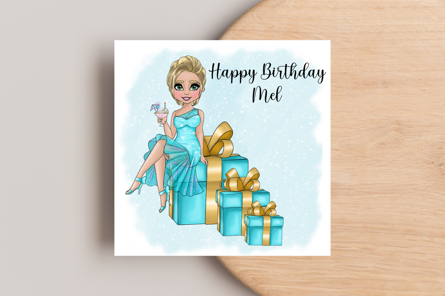 Personalised Birthday Card Personalised- Lady in Blue Dress Sitting on Glittering Presents