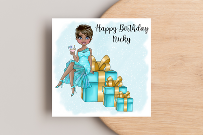 Personalised Birthday Card Personalised- Lady in Blue Dress Sitting on Glittering Presents