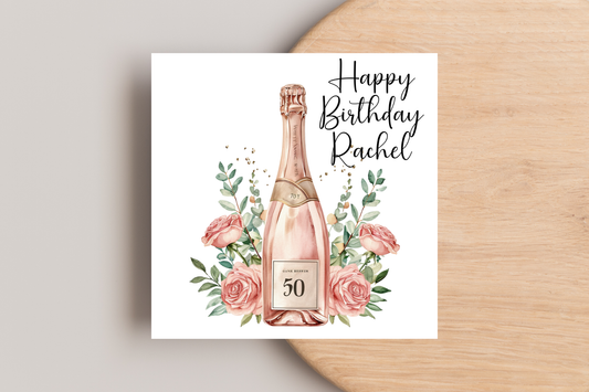 Personalised 50th Birthday Card - Rose Gold Champagne Bottle and Flowers